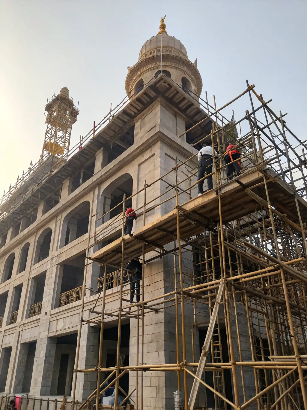 A construction site in Bristol with a focus on a newly renovated residential building, highlighting OA Design & Build's construction services.